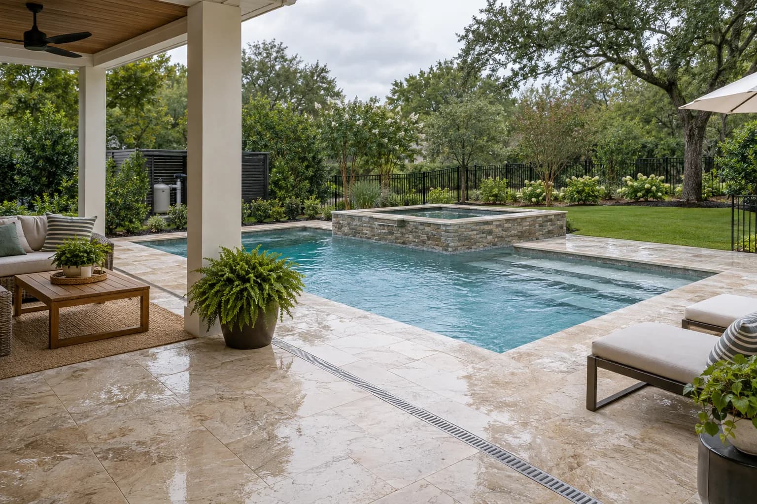 Southern backyard pool concept with a shaded terrace, rain-conscious grading, and secure perimeter